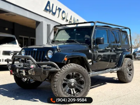 Black 2015 Jeep Wrangler Unlimited Sahara for sale in Jacksonville, FL