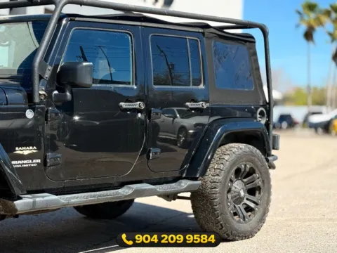 Another view of 2015 Jeep Wrangler Unlimited Sahara for sale in Jacksonville, FL at AUTOLAND