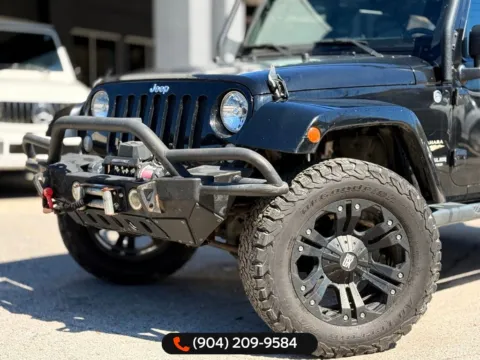 More photos of 2015 Jeep Wrangler Unlimited Sahara at AUTOLAND, FL