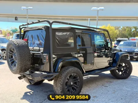 More photos of 2015 Jeep Wrangler Unlimited Sahara at AUTOLAND, FL