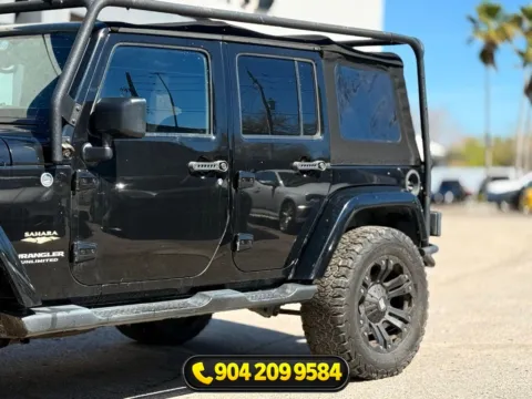 Another view of 2015 Jeep Wrangler Unlimited Sahara for sale in Jacksonville, FL at AUTOLAND
