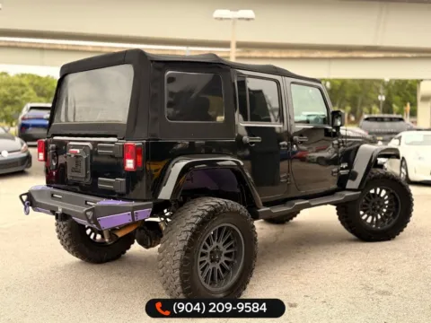 More photos of 2017 Jeep Wrangler Unlimited Sahara at AUTOLAND, FL