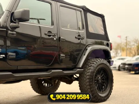Another view of 2017 Jeep Wrangler Unlimited Sahara for sale in Jacksonville, FL at AUTOLAND