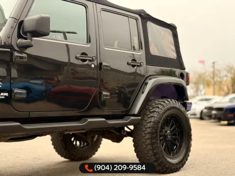 Another view of 2017 Jeep Wrangler Unlimited Sahara for sale in Jacksonville, FL at AUTOLAND