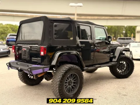 More photos of 2017 Jeep Wrangler Unlimited Sahara at AUTOLAND, FL
