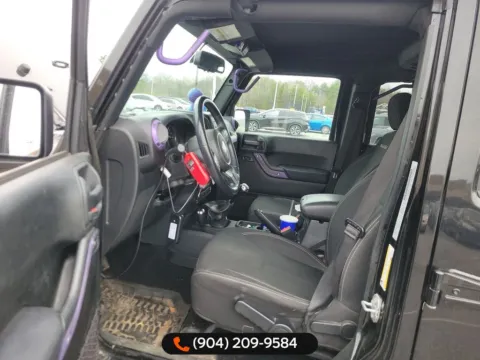 More photos of 2017 Jeep Wrangler Unlimited Sahara at AUTOLAND, FL