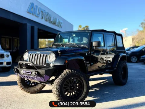 Black 2017 Jeep Wrangler Unlimited Sahara for sale in Jacksonville, FL