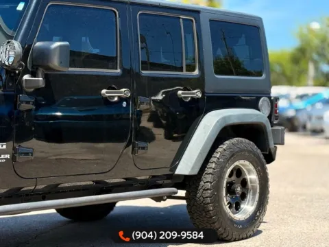 Another view of 2016 Jeep Wrangler Unlimited Sport for sale in Jacksonville, FL at AUTOLAND