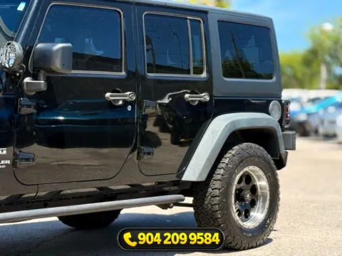 Another view of 2016 Jeep Wrangler Unlimited Sport for sale in Jacksonville, FL at AUTOLAND