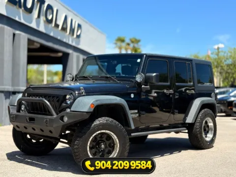 Black 2016 Jeep Wrangler Unlimited Sport for sale in Jacksonville, FL