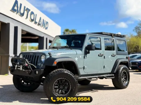 Gray 2014 Jeep Wrangler Unlimited Sport for sale in Jacksonville, FL