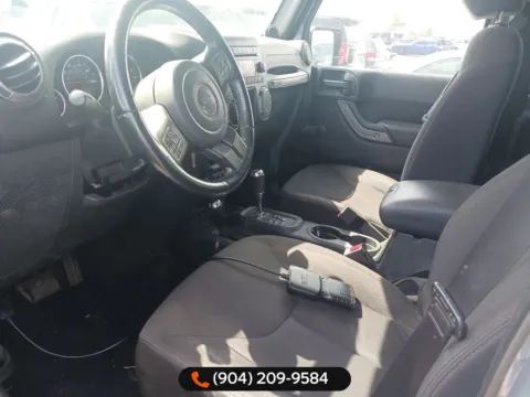 Photos of 2014 Jeep Wrangler Unlimited Sport for sale in Jacksonville, FL at AUTOLAND