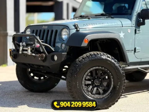 Photos of 2014 Jeep Wrangler Unlimited Sport for sale in Jacksonville, FL at AUTOLAND