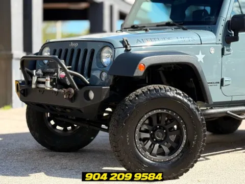 Photos of 2014 Jeep Wrangler Unlimited Sport for sale in Jacksonville, FL at AUTOLAND
