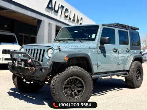 Gray 2014 Jeep Wrangler Unlimited Sport for sale in Jacksonville, FL