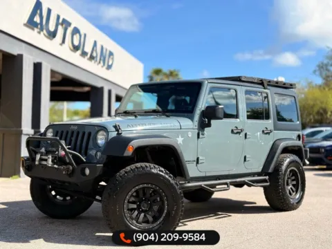 Gray 2014 Jeep Wrangler Unlimited Sport for sale in Jacksonville, FL