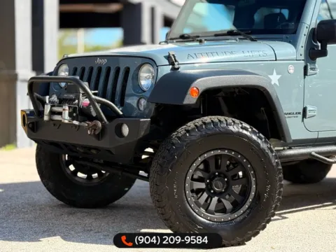 Photos of 2014 Jeep Wrangler Unlimited Sport for sale in Jacksonville, FL at AUTOLAND