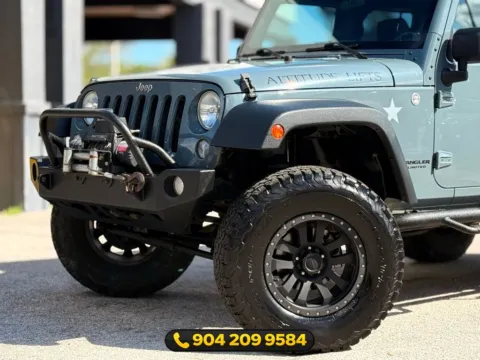 Photos of 2014 Jeep Wrangler Unlimited Sport for sale in Jacksonville, FL at AUTOLAND