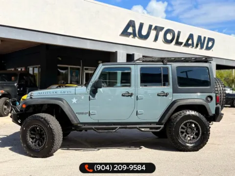 More photos of 2014 Jeep Wrangler Unlimited Sport at AUTOLAND, FL