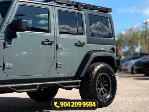 More photos of 2014 Jeep Wrangler Unlimited Sport at AUTOLAND, FL