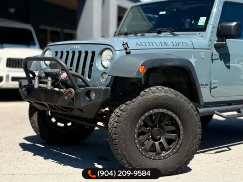 Photos of 2014 Jeep Wrangler Unlimited Sport for sale in Jacksonville, FL at AUTOLAND