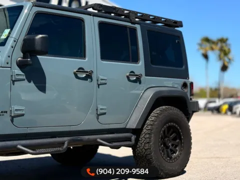 More photos of 2014 Jeep Wrangler Unlimited Sport at AUTOLAND, FL