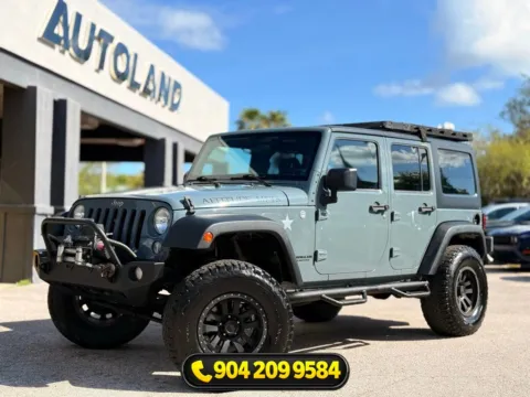 Gray 2014 Jeep Wrangler Unlimited Sport for sale in Jacksonville, FL