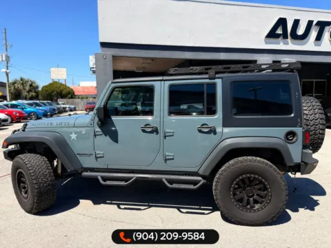More photos of 2014 Jeep Wrangler Unlimited Sport at AUTOLAND, FL