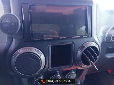 More photos of 2018 Jeep Wrangler JK Sport at AUTOLAND, FL