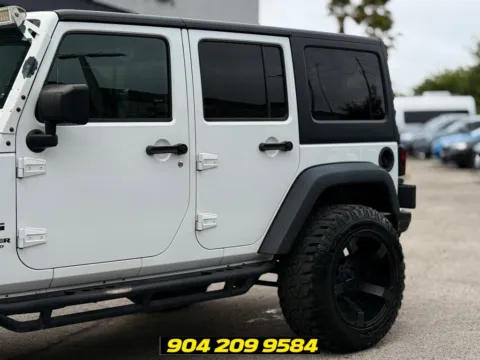 Another view of 2016 Jeep Wrangler Unlimited Sport for sale in Jacksonville, FL at AUTOLAND