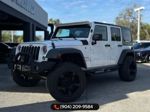 White 2016 Jeep Wrangler Unlimited Sport for sale in Jacksonville, FL