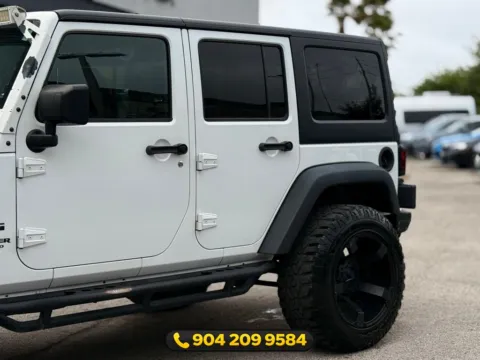 Another view of 2016 Jeep Wrangler Unlimited Sport for sale in Jacksonville, FL at AUTOLAND