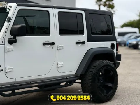 Another view of 2016 Jeep Wrangler Unlimited Sport for sale in Jacksonville, FL at AUTOLAND