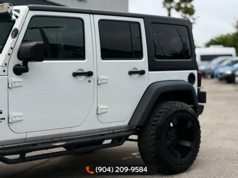 Another view of 2016 Jeep Wrangler Unlimited Sport for sale in Jacksonville, FL at AUTOLAND