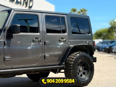 Another view of 2016 Jeep Wrangler Unlimited Freedom Edition for sale in Jacksonville, FL at AUTOLAND