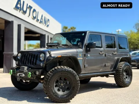 Gray 2016 Jeep Wrangler Unlimited Freedom Edition for sale in Jacksonville, FL