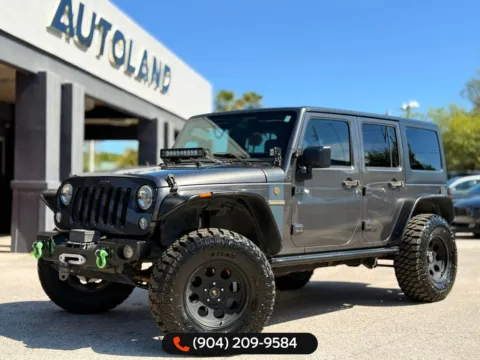Gray 2016 Jeep Wrangler Unlimited Freedom Edition for sale in Jacksonville, FL