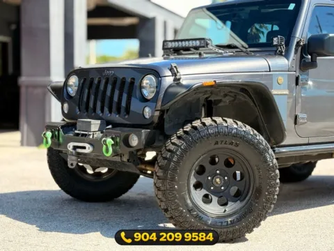 Photos of 2016 Jeep Wrangler Unlimited Freedom Edition for sale in Jacksonville, FL at AUTOLAND