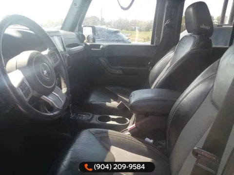 Another view of 2016 Jeep Wrangler Unlimited Freedom Edition for sale in Jacksonville, FL at AUTOLAND