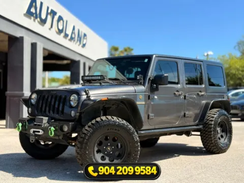 Gray 2016 Jeep Wrangler Unlimited Freedom Edition for sale in Jacksonville, FL