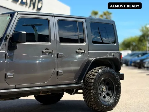 Another view of 2016 Jeep Wrangler Unlimited Freedom Edition for sale in Jacksonville, FL at AUTOLAND