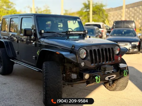 Another view of 2016 Jeep Wrangler Unlimited Freedom Edition for sale in Jacksonville, FL at AUTOLAND