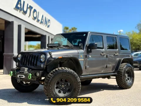 Gray 2016 Jeep Wrangler Unlimited Freedom Edition for sale in Jacksonville, FL