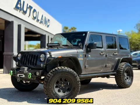 Gray 2016 Jeep Wrangler Unlimited Freedom Edition for sale in Jacksonville, FL