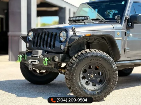 Photos of 2016 Jeep Wrangler Unlimited Freedom Edition for sale in Jacksonville, FL at AUTOLAND