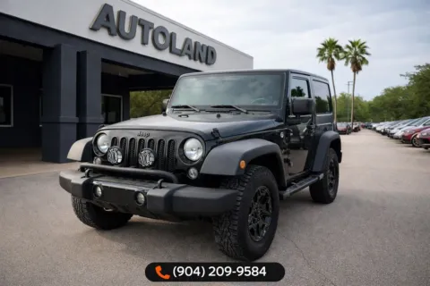 Black 2014 Jeep Wrangler Willys Wheeler for sale in Jacksonville, FL