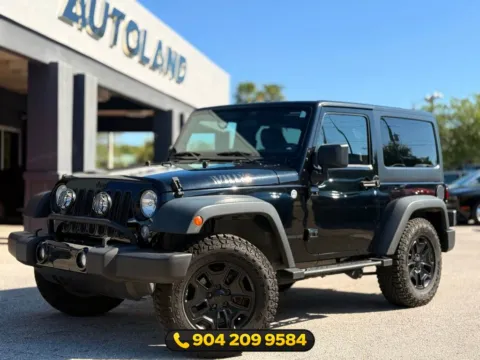 Black 2014 Jeep Wrangler Willys Wheeler for sale in Jacksonville, FL