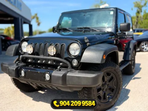 Photos of 2014 Jeep Wrangler Willys Wheeler for sale in Jacksonville, FL at AUTOLAND