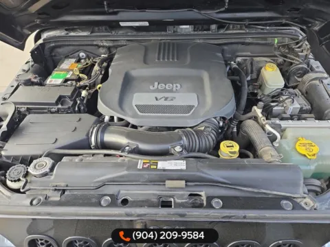 More photos of 2014 Jeep Wrangler Willys Wheeler at AUTOLAND, FL