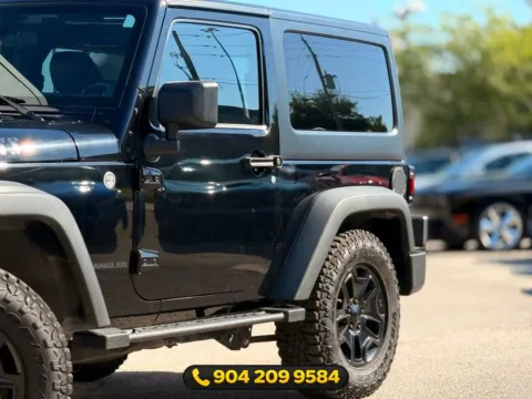 Another view of 2014 Jeep Wrangler Willys Wheeler for sale in Jacksonville, FL at AUTOLAND